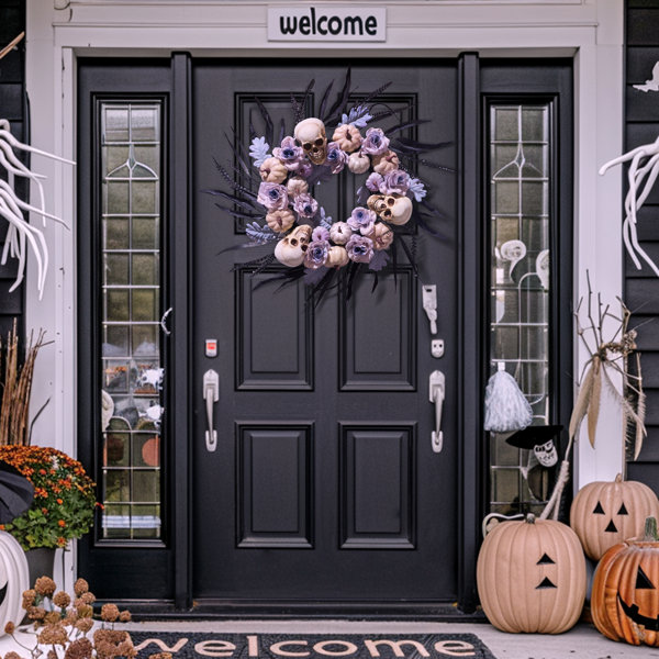 The holiday aisle 20 inch halloween pumpkin skeleton and roses
